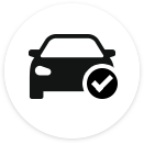 An icon of the front of a car with a check mark in overlaid on its corner