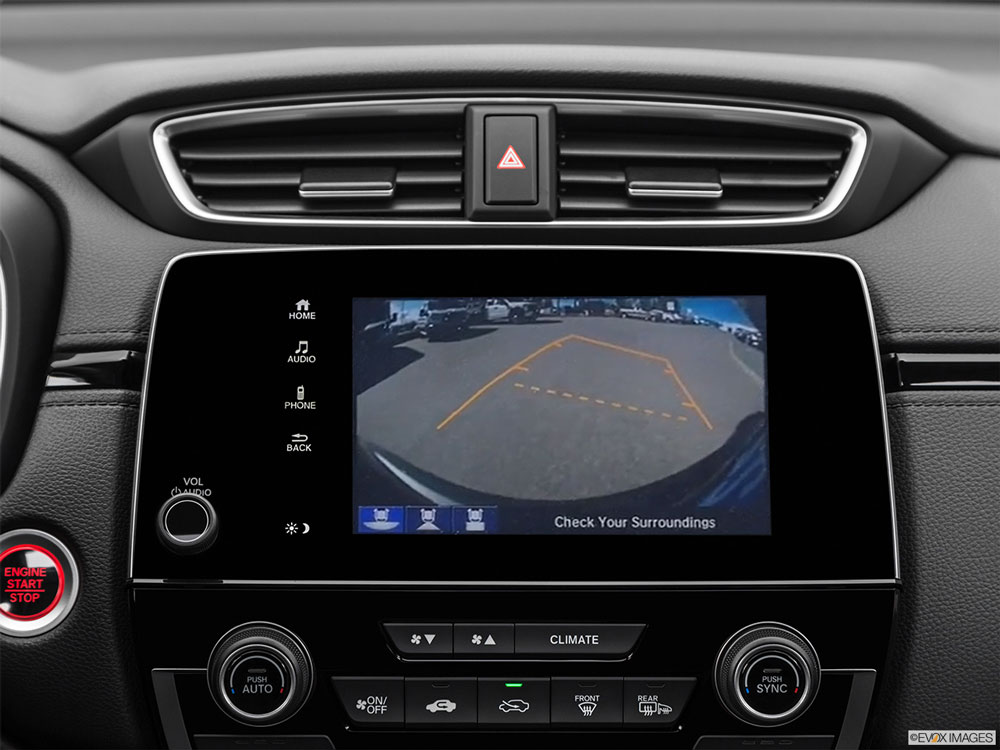 Picture showing the honda cr-v backup camera settings and video feed, as well as other controls such as the CRV push button start.