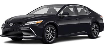 A picture of a red 2023 Toyota Camry LE sedan