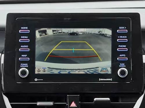 A picture of the center console display screen, showing a view from the 2023 Toyota Camery's backup camera.