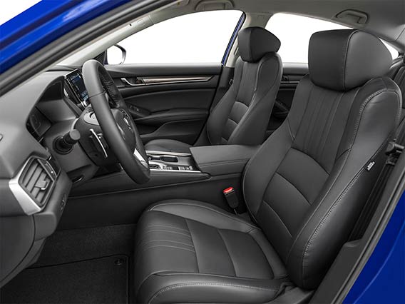 A picture of the new 2022 Accord interior through the open, front diver's side door.