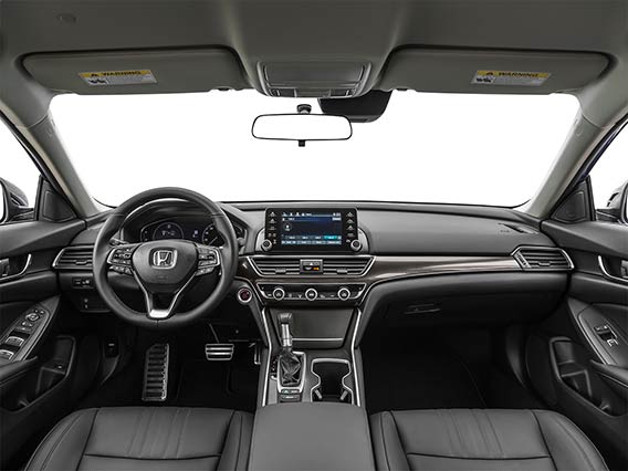 A forward view from above the Honda Accord center console, looking at the front seat area and dashboard controls.