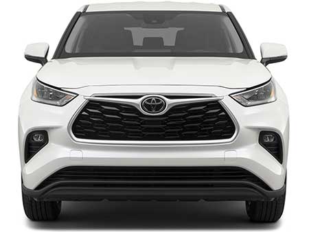 A head on picture of a Toyota Highlander taken from the height of the front bumper and black grill.
